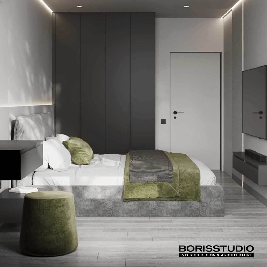 Сіра спальня з м'яким текстилем