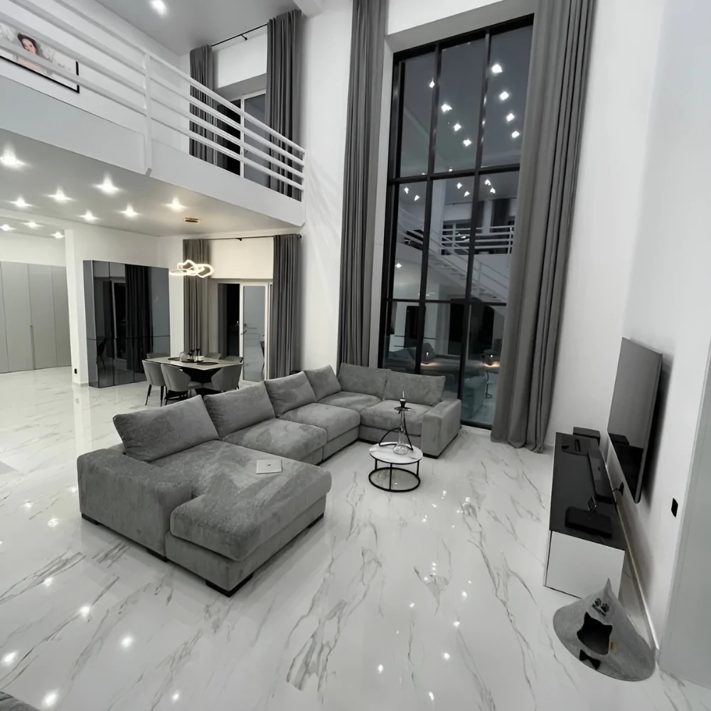 Дизайн інтер'єру вітальні заміського будинку в стилі хай-тек